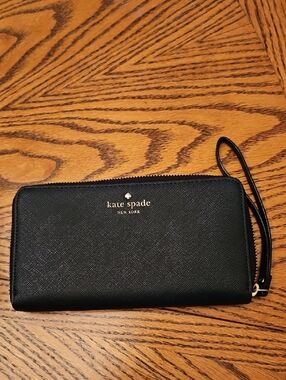 kate spade black zip-around wristlet wallet with gold logo